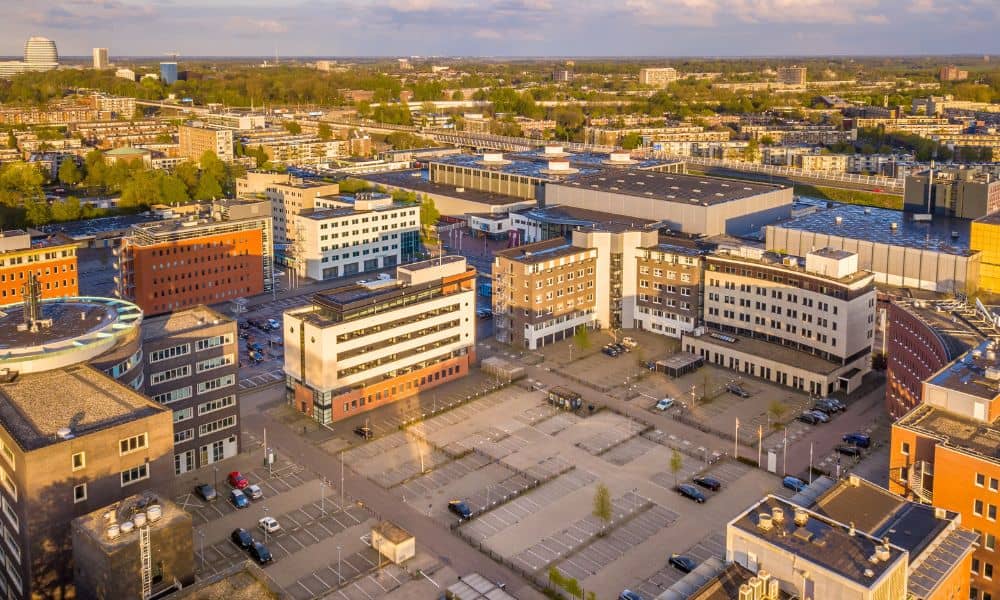 Aerial view of a commercial property with several buildings and site features related to ALTA land survey cost
