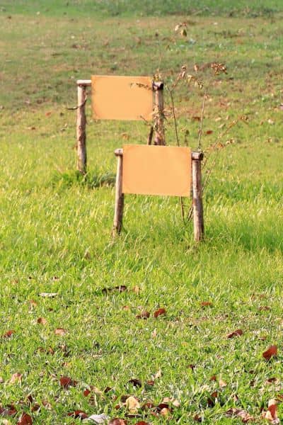 Survey markers placed on land during a boundary survey for property development
