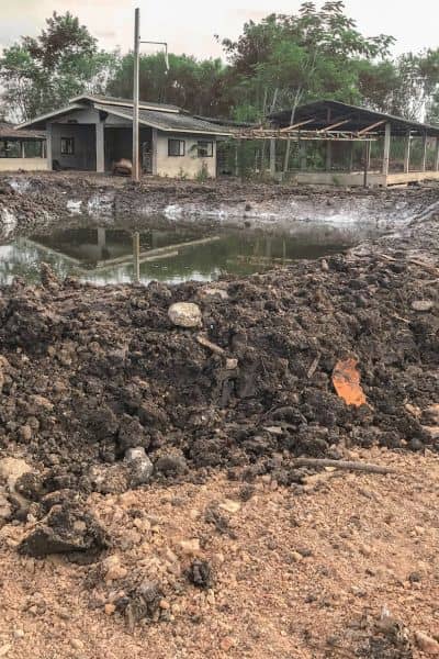 Detention pond under construction to control stormwater runoff and support flood study requirements for new developments
