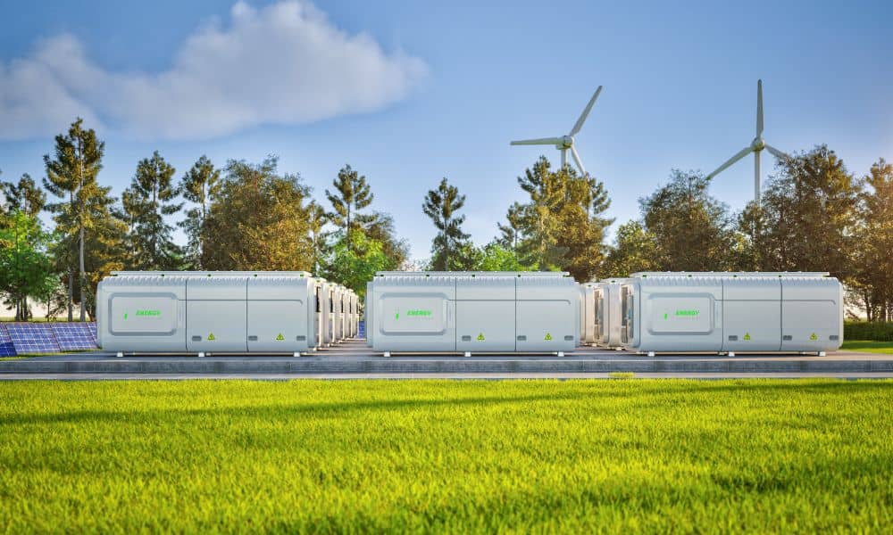 Battery storage equipment on prepared pads at a site planned for construction staking